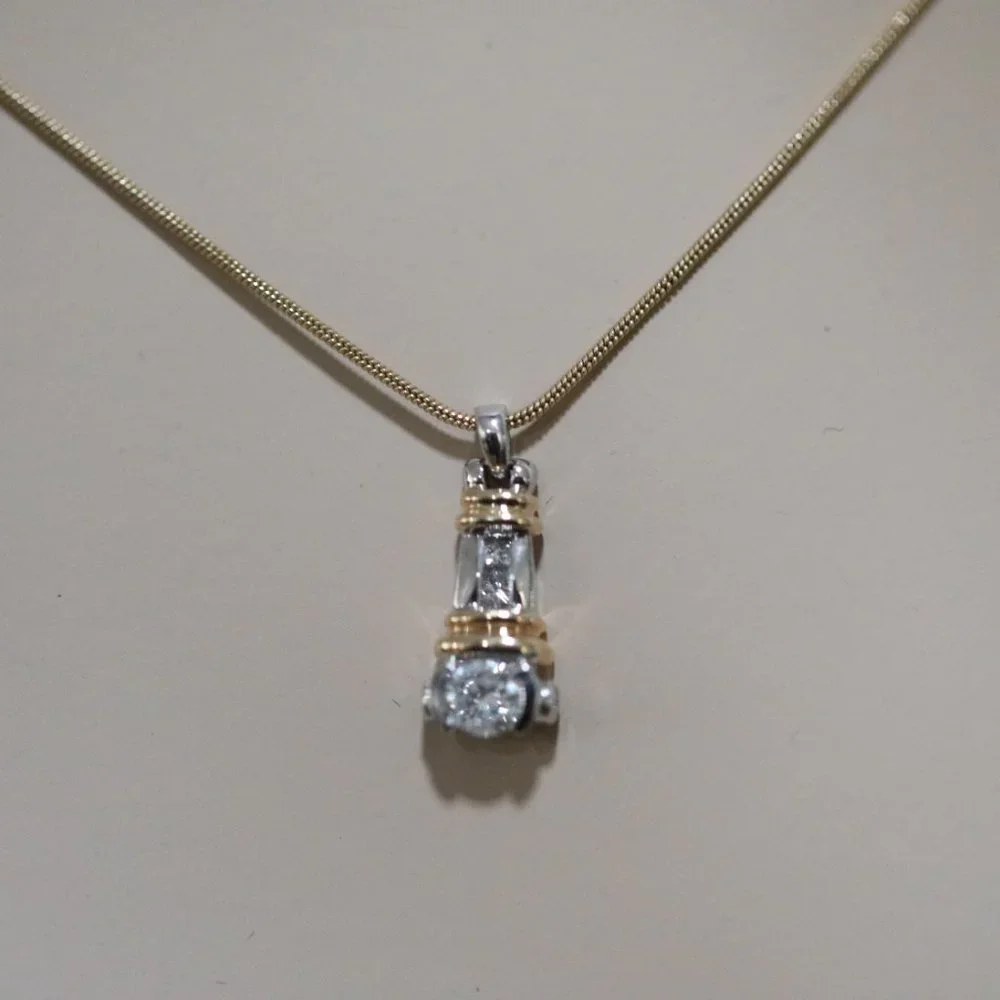 LADIES VINTAGE 14 KARAT WHITE & YELLOW GOLD BEZEL SET DIAMOND PENDANT